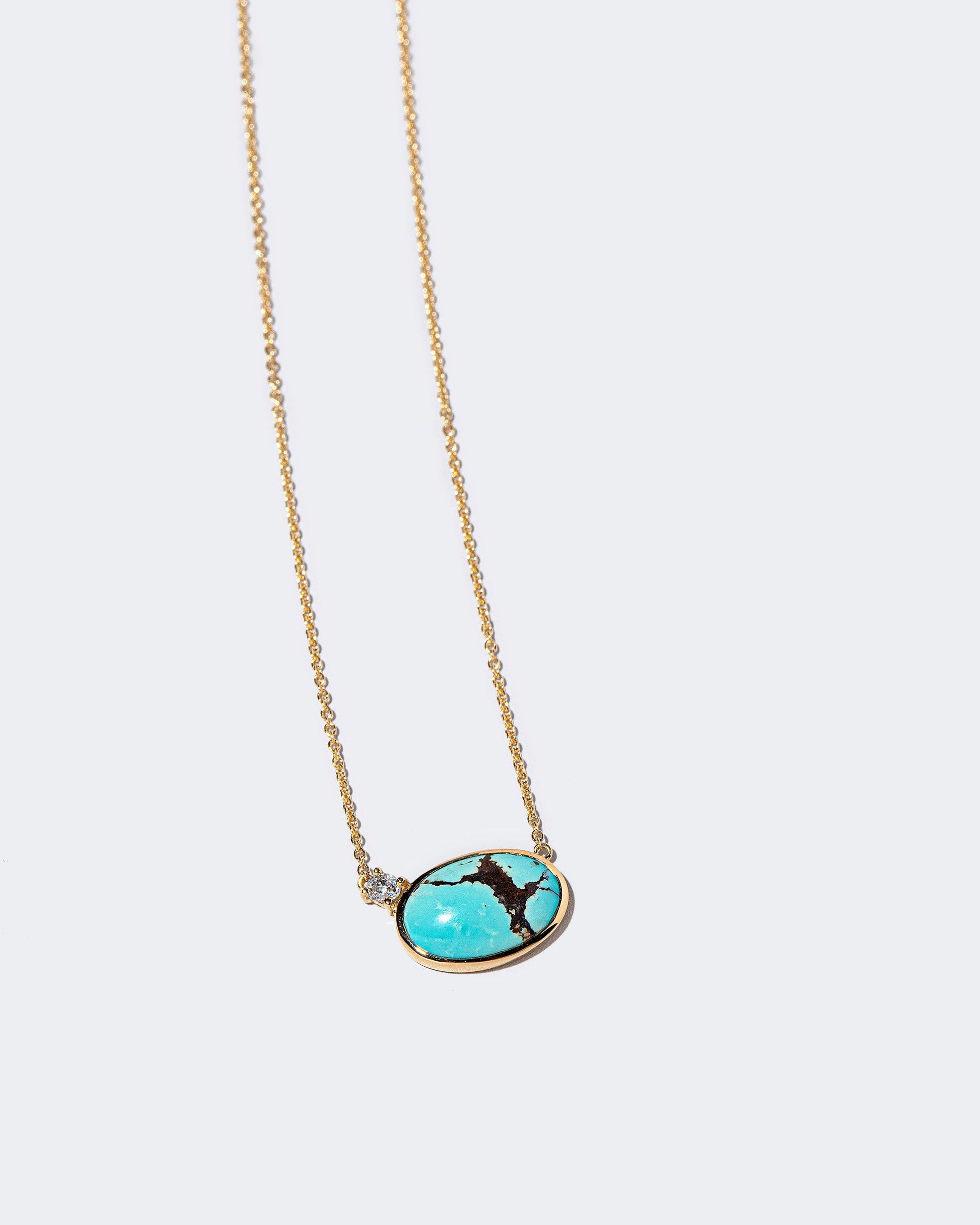 In-Between Necklace on light color background.