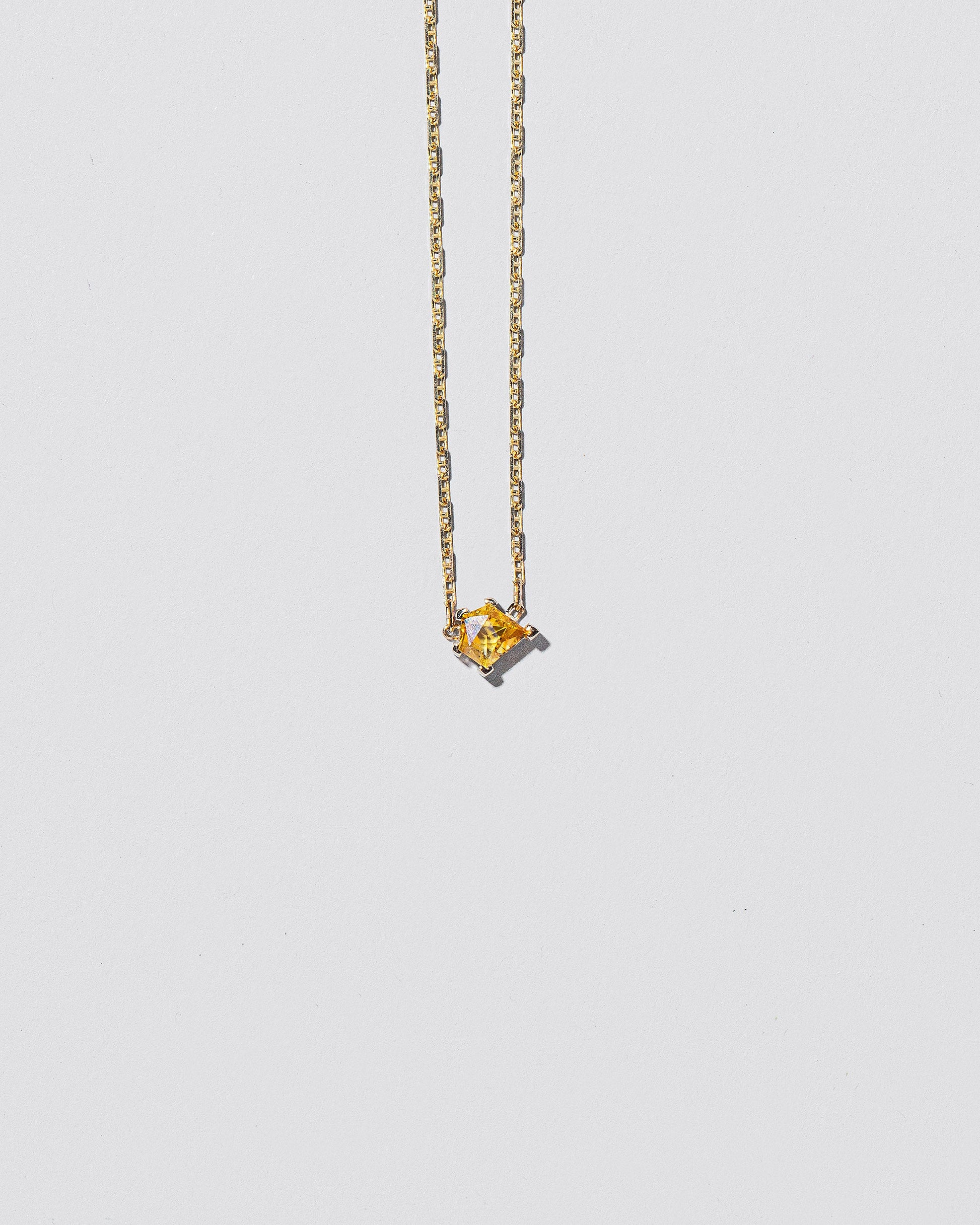  Be True Necklace on light color background.