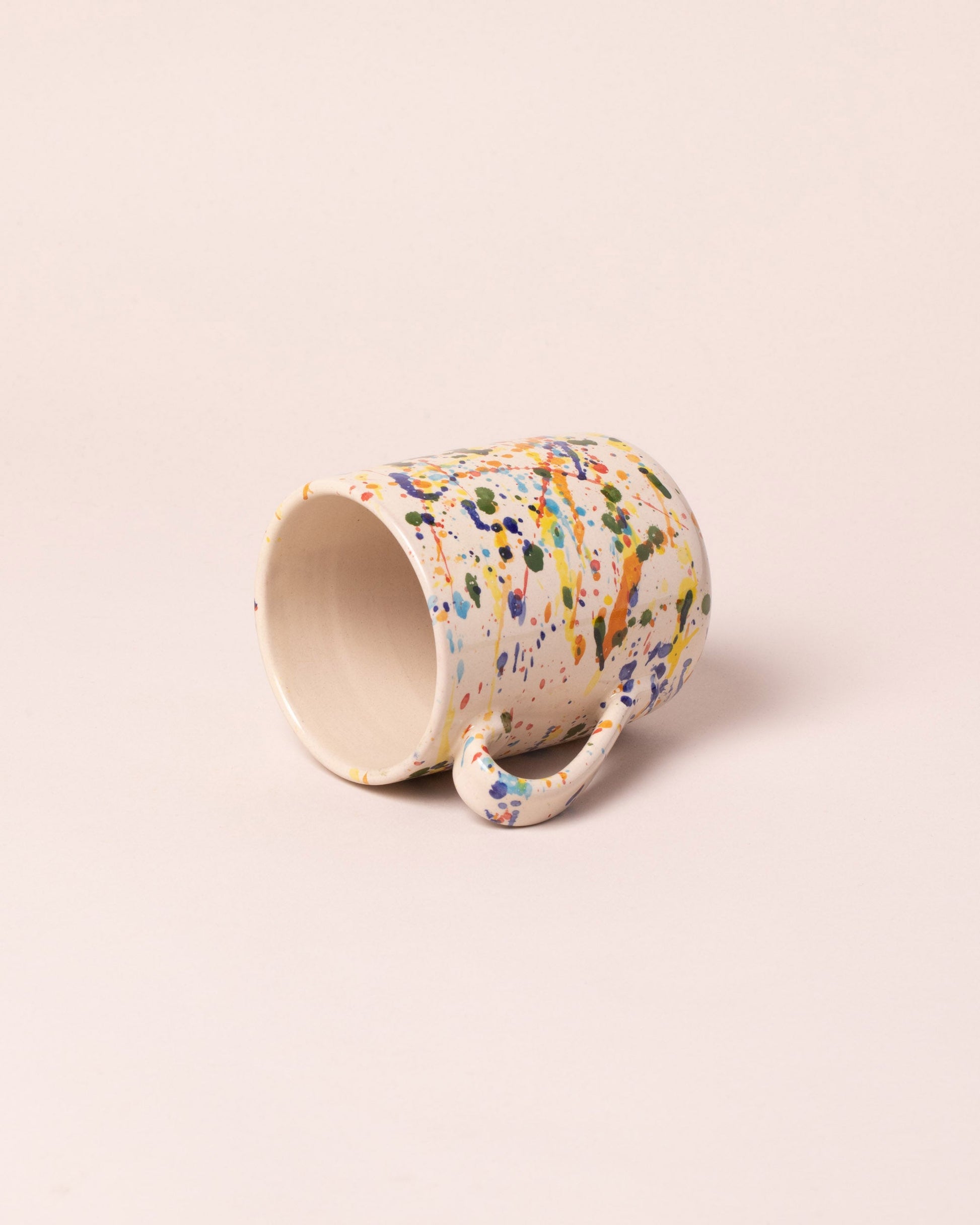  Del Monaco Coffee Mug on light color background.