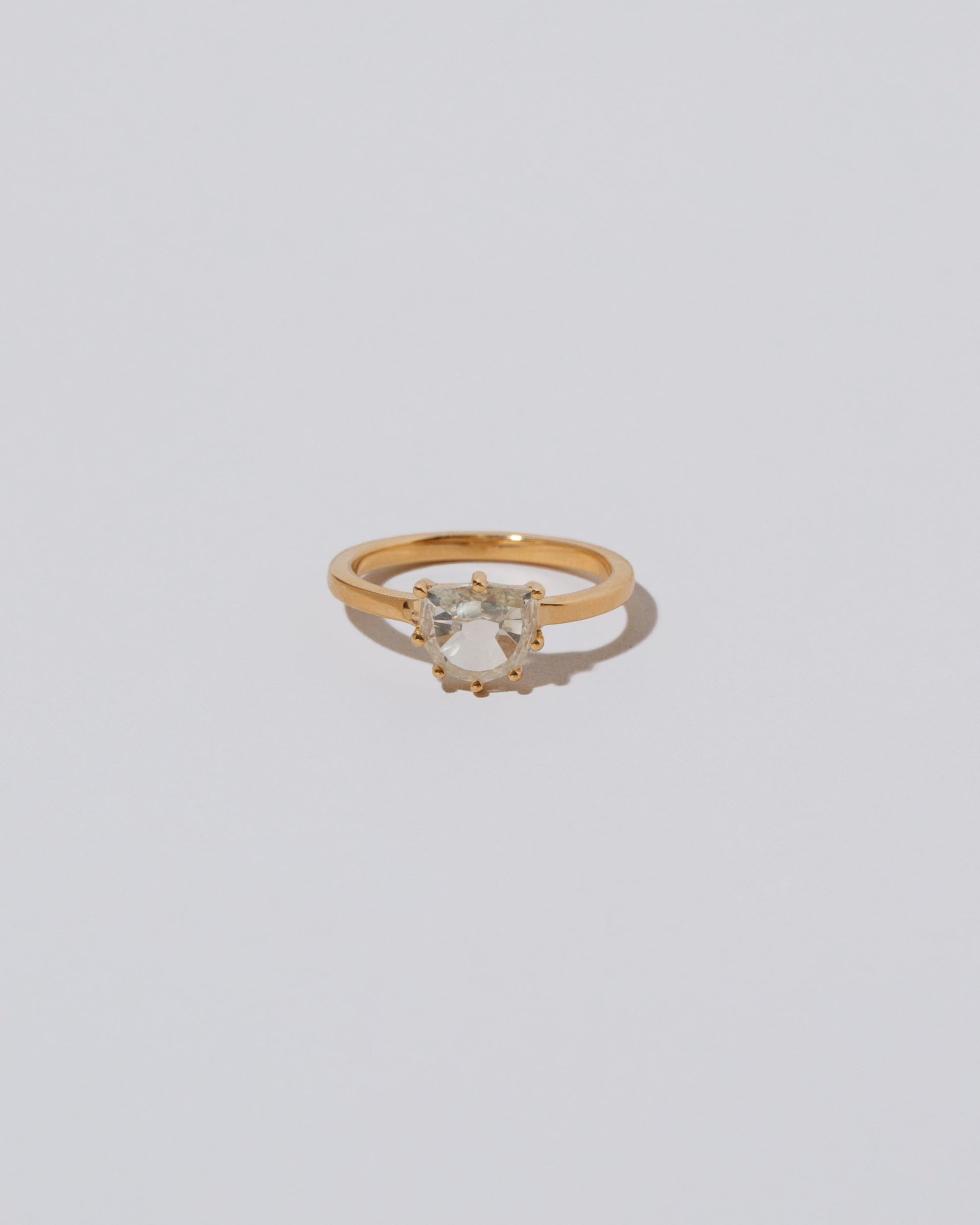 Coupé Ring on light color background.