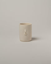 Rami Kim Matte Speckled Oatmeal Mini Face Tumblers on light color background.