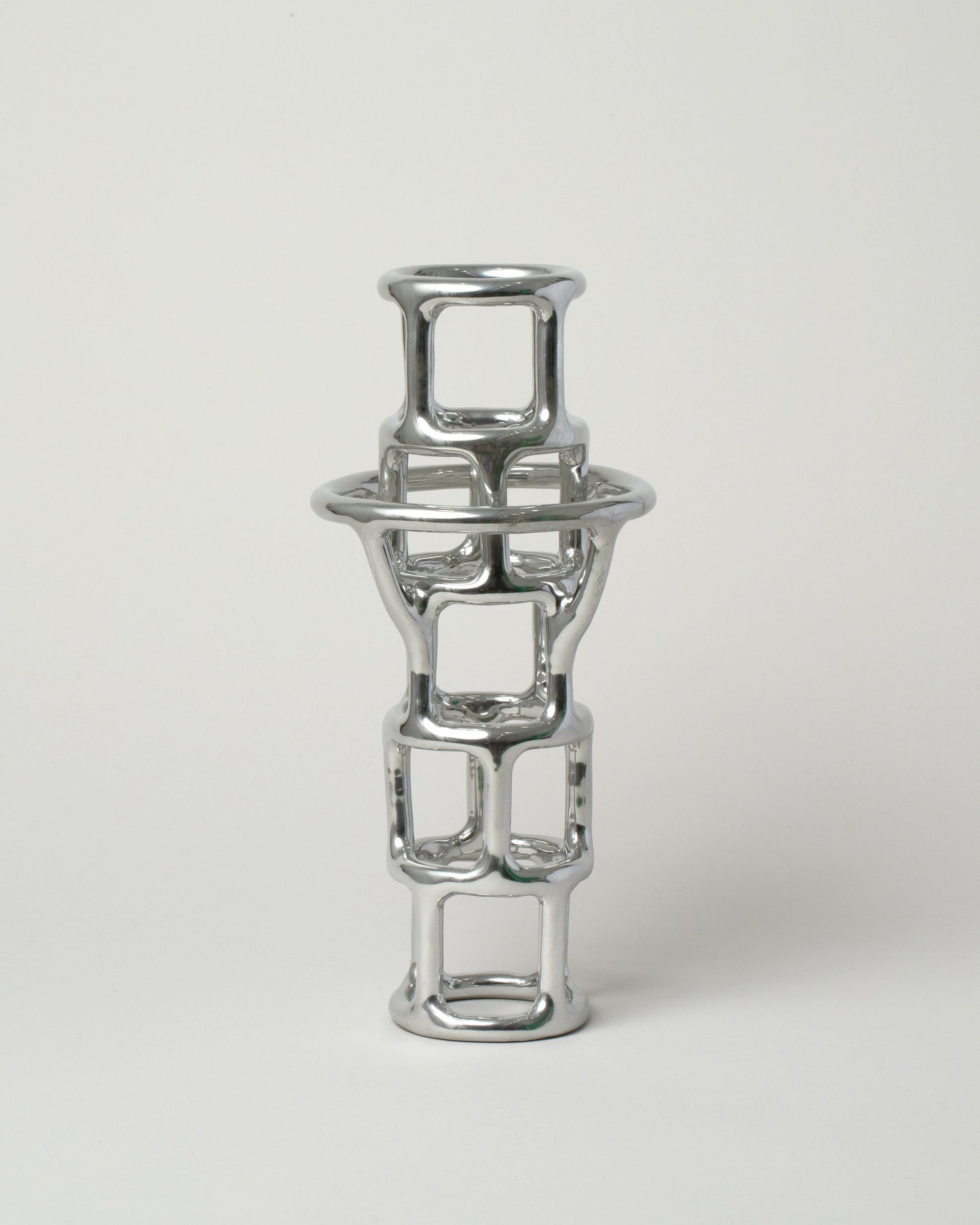  Solenne Belloir Chrome Water Tower on light color background.