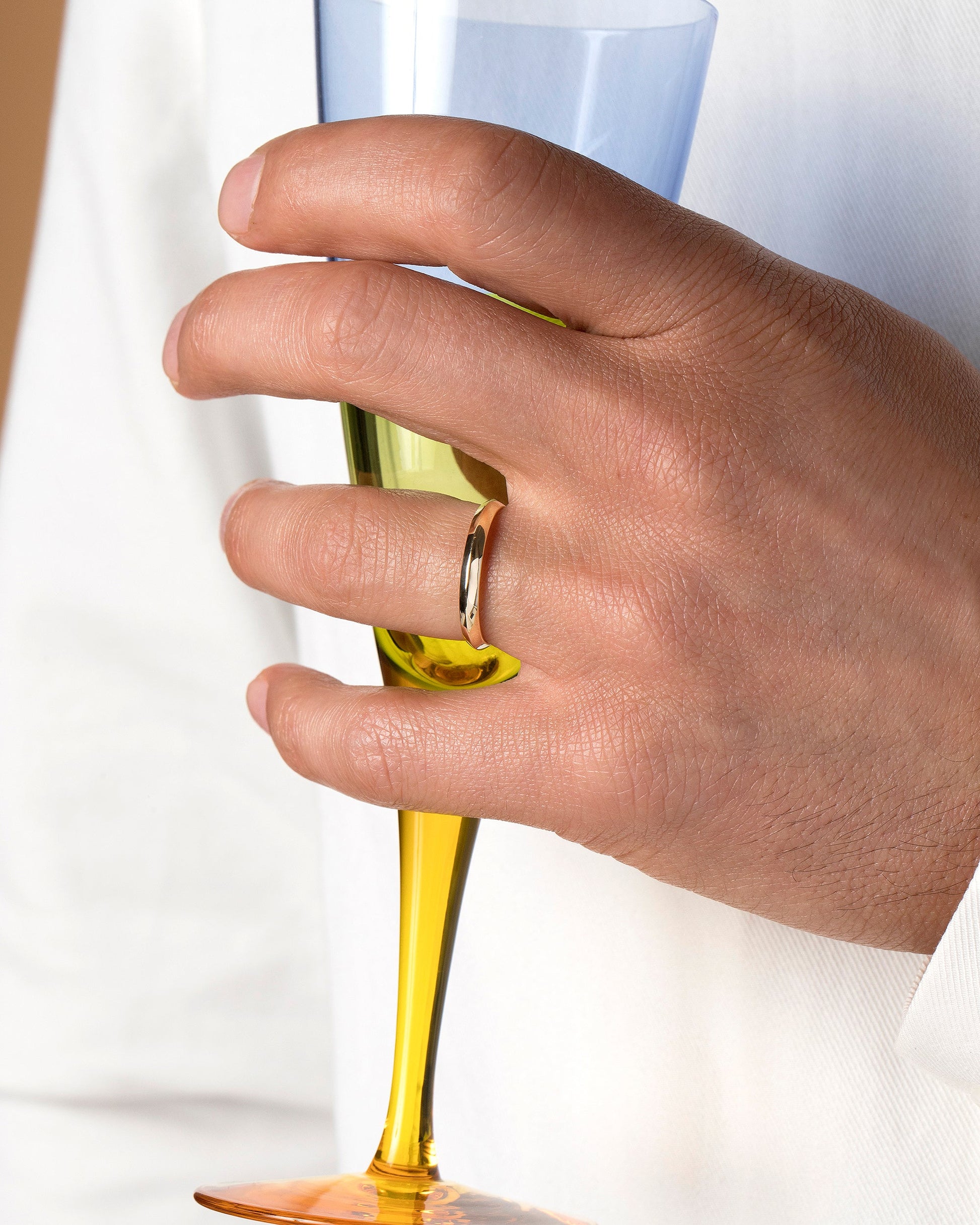 Gold 2.5mm Knife Edge Band on model.