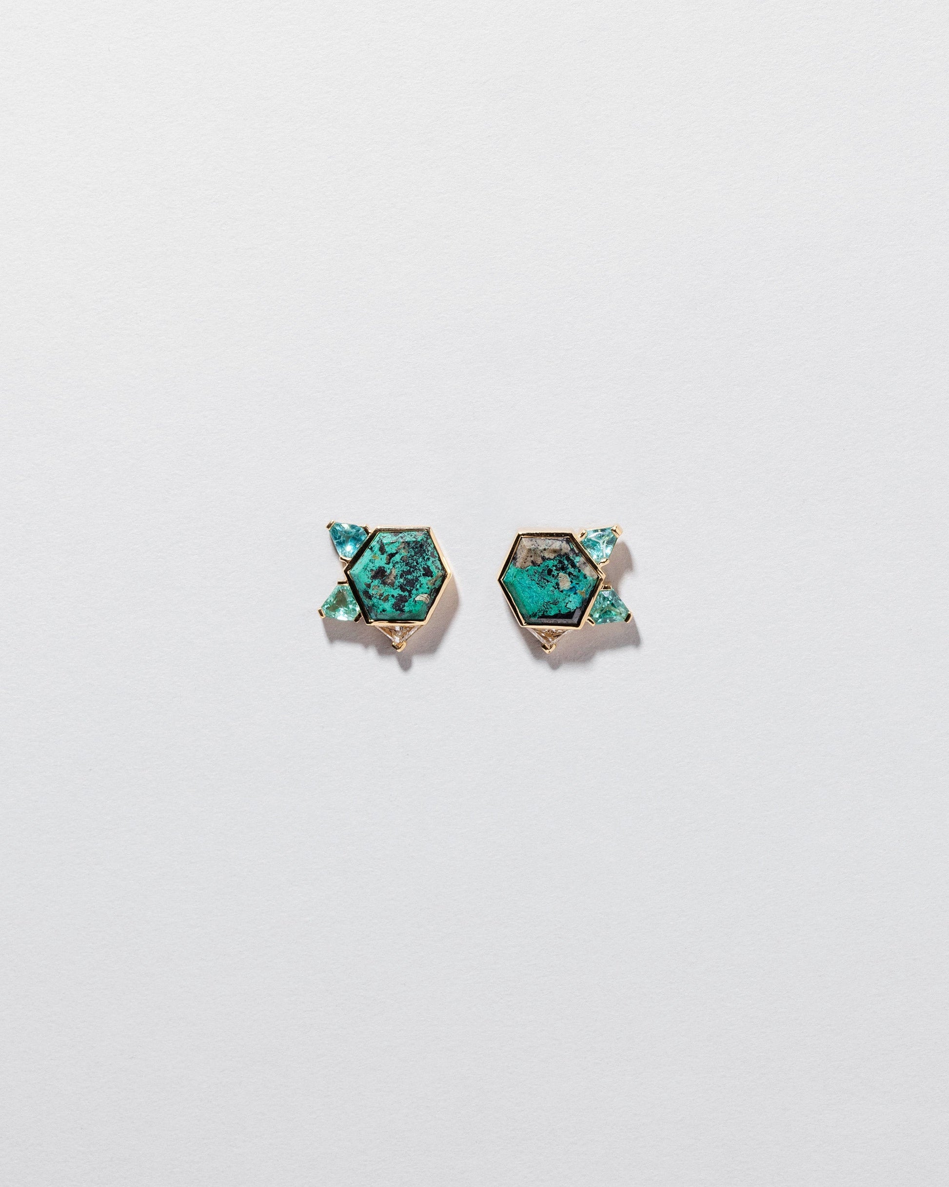  Azure Earrings on light color background.