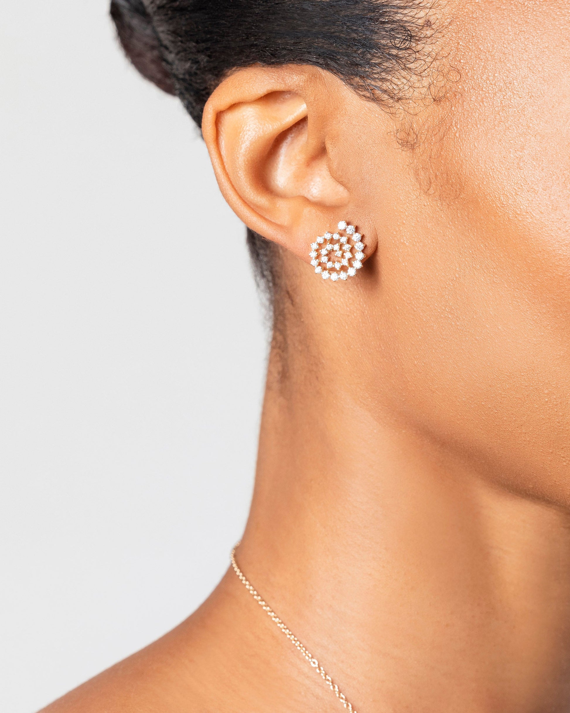 Spiral Earring Single Stud on model.