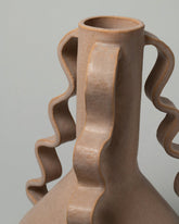 Closeup details of the Morgan Peck Mauve Swoop Vase on light color background.