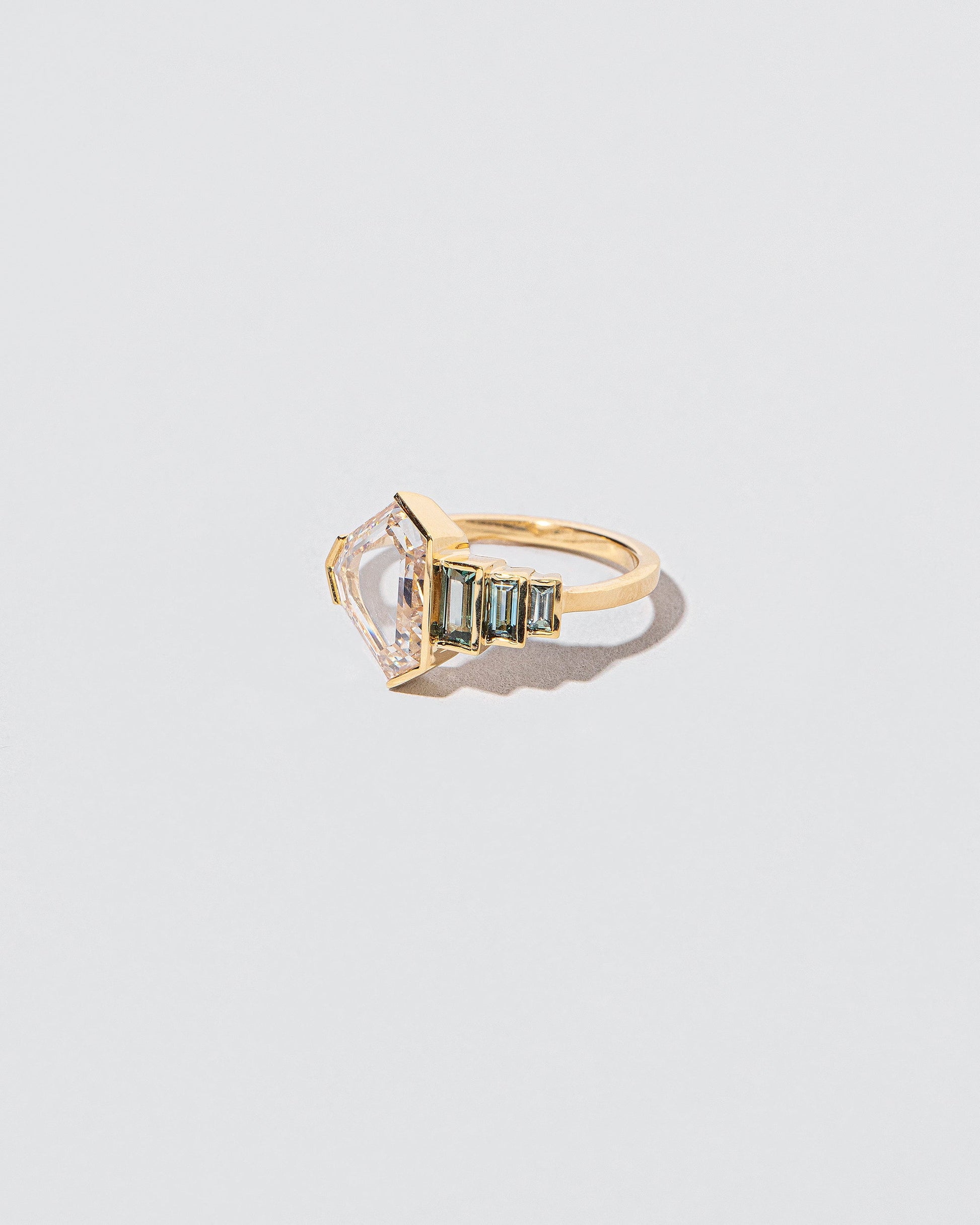  Transcendence Ring on light color background.