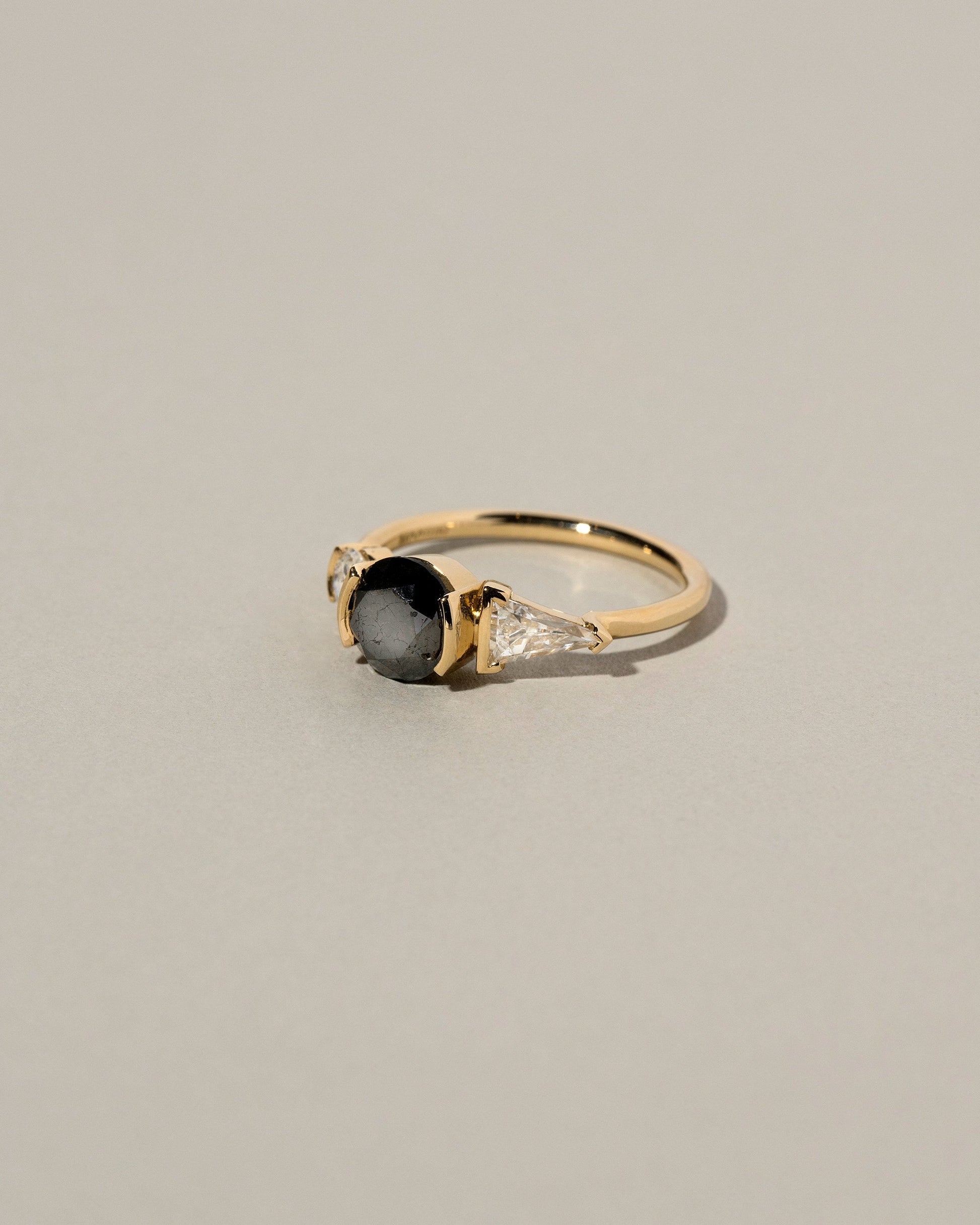  Black and White Diamond Ring on light color background.