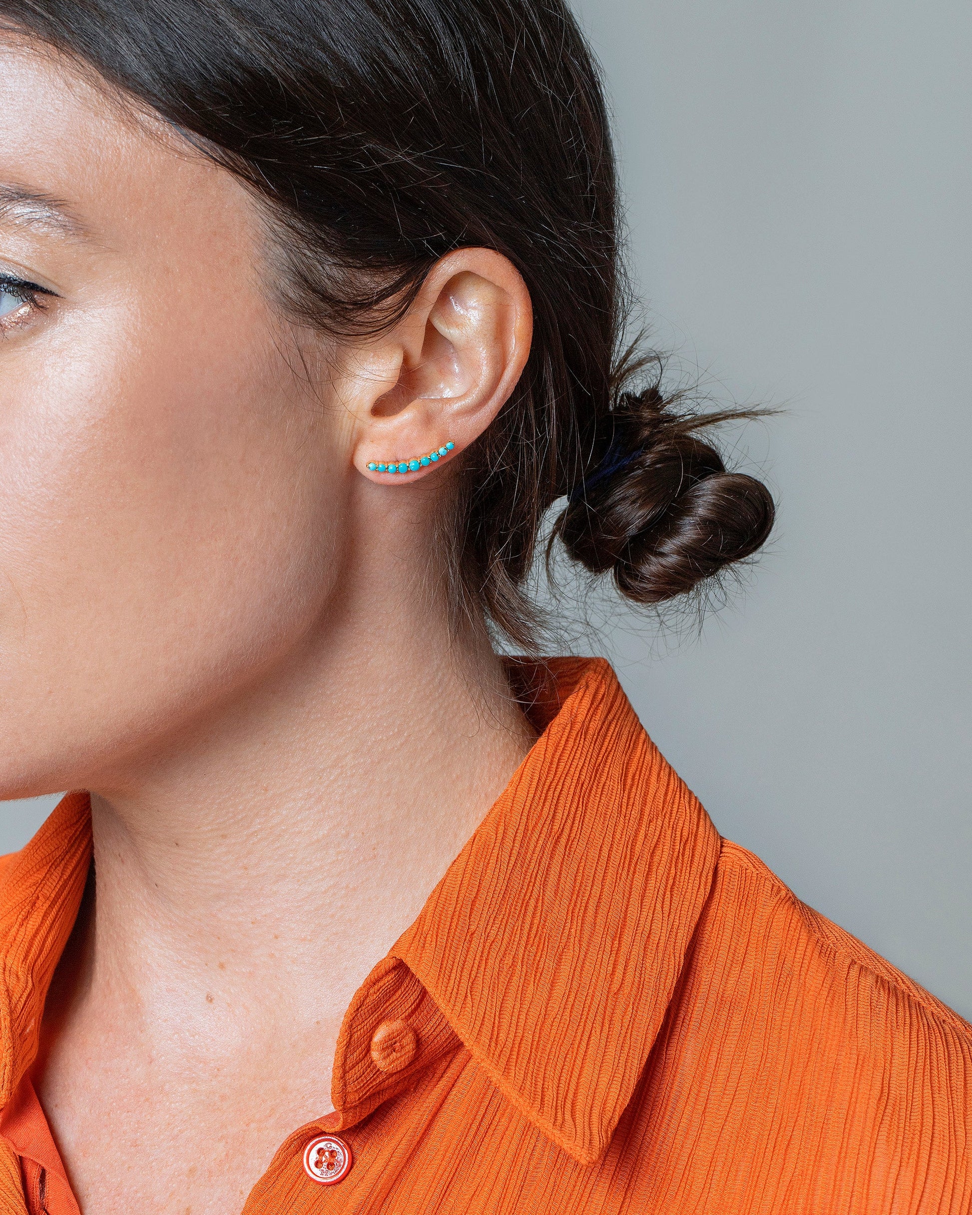 Turquoise Crescent Ear Climber Stud Earrings on model.