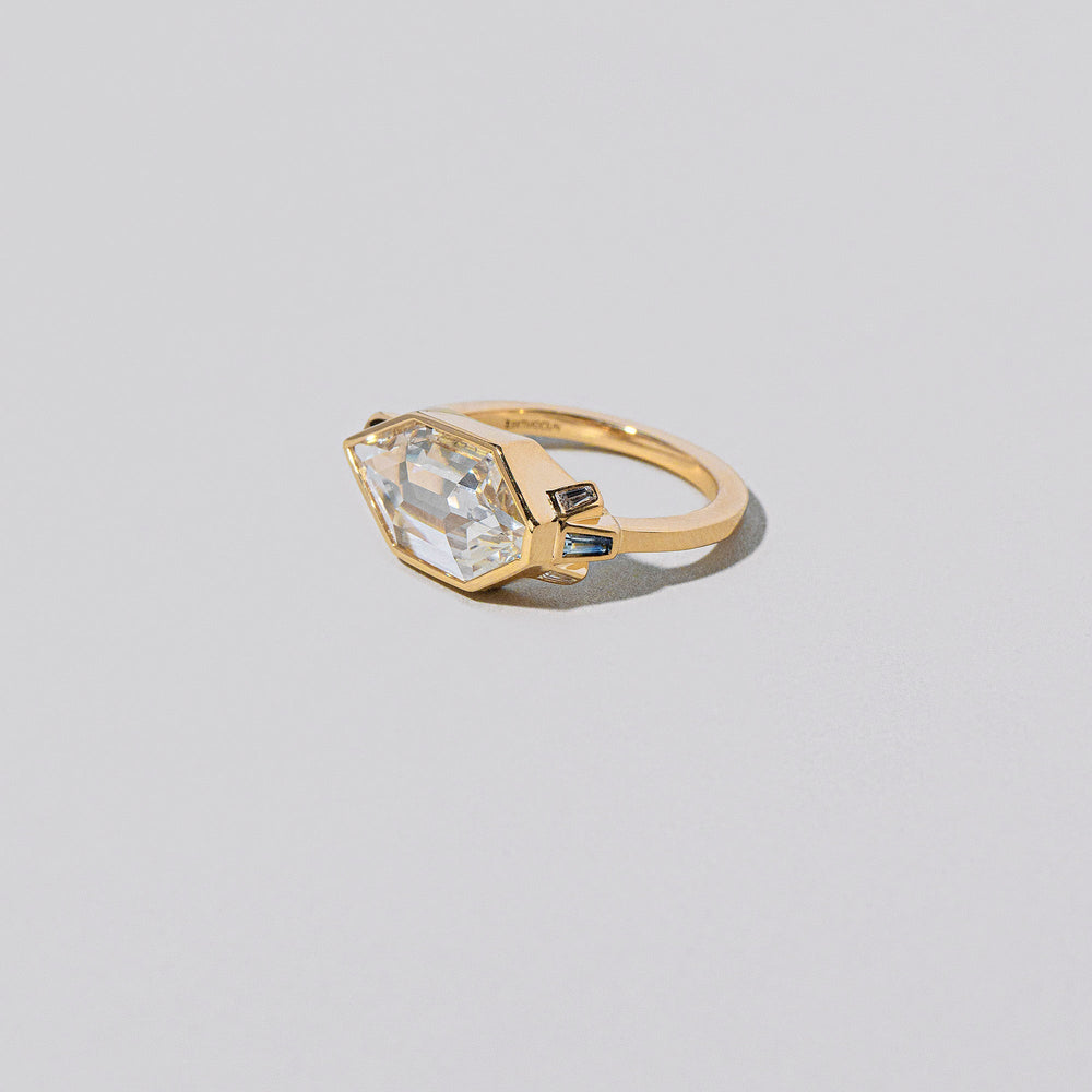 product_details:: Okama Ring on light color background.