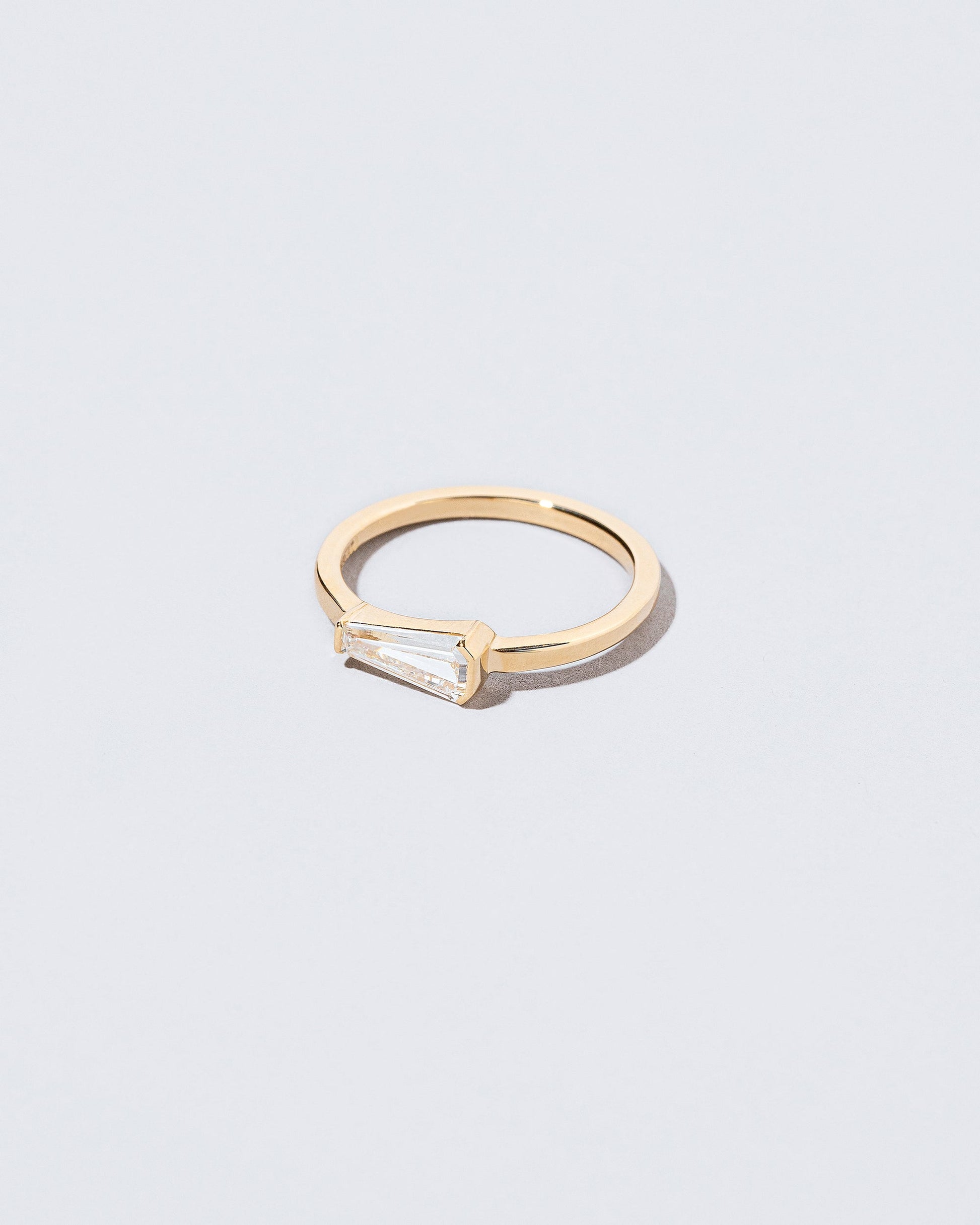 View from the side of the Niphredil Ring on light color background.