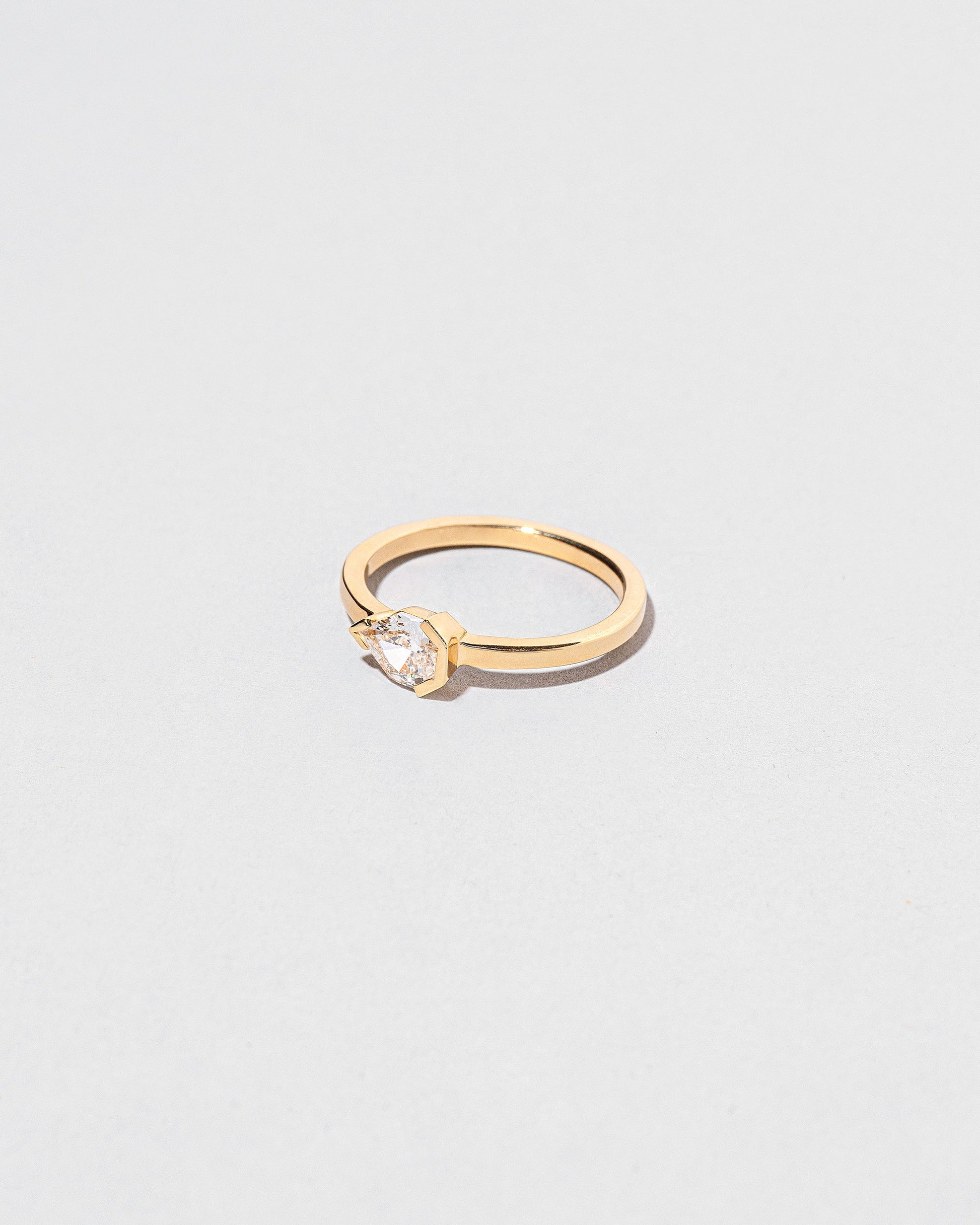 View from the side of the Serenna Ring on light color background.