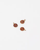  Sliced Fruit Charms - Grapefruit on light color background.