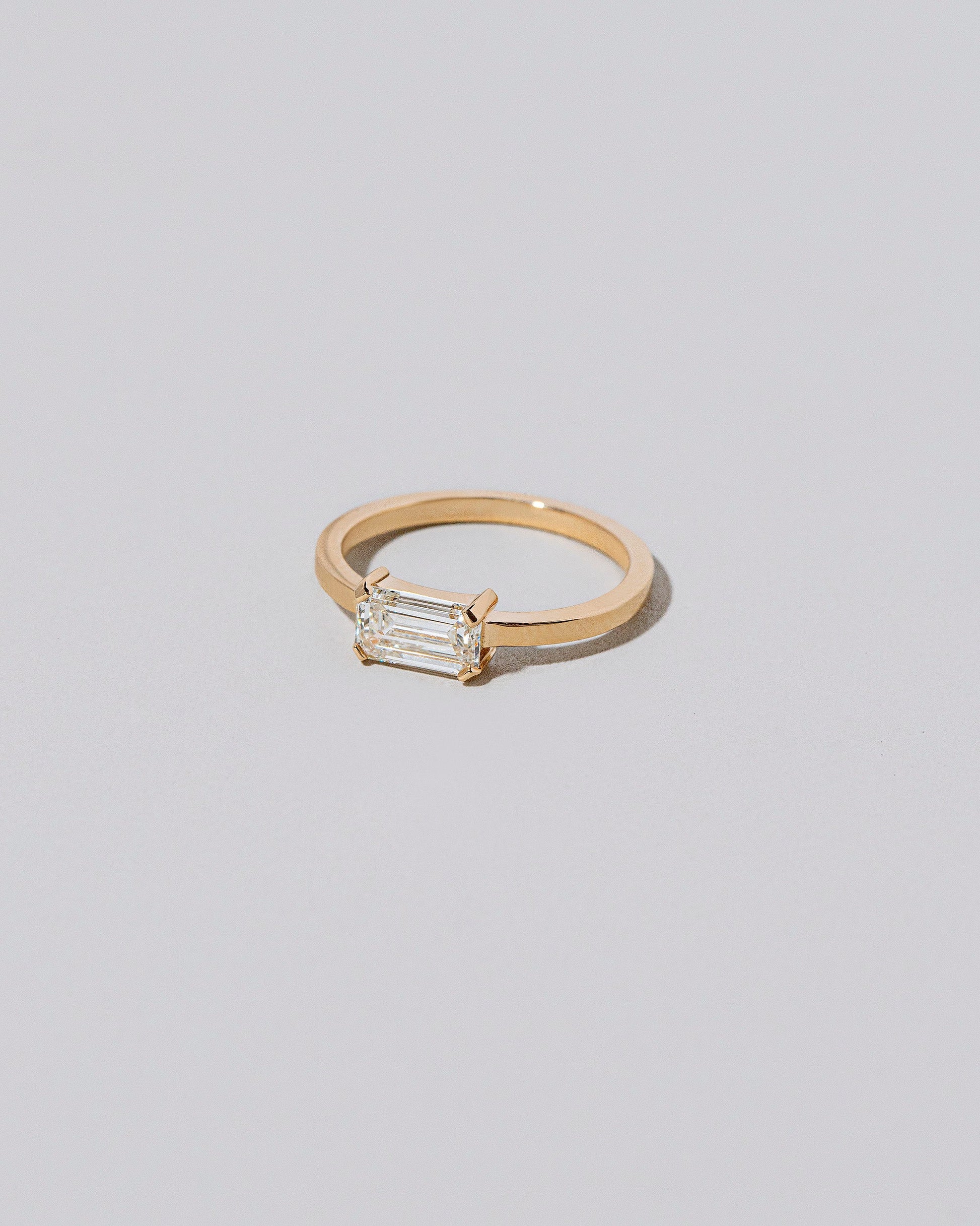 View from the side of the Yesterday Ring on light color background.