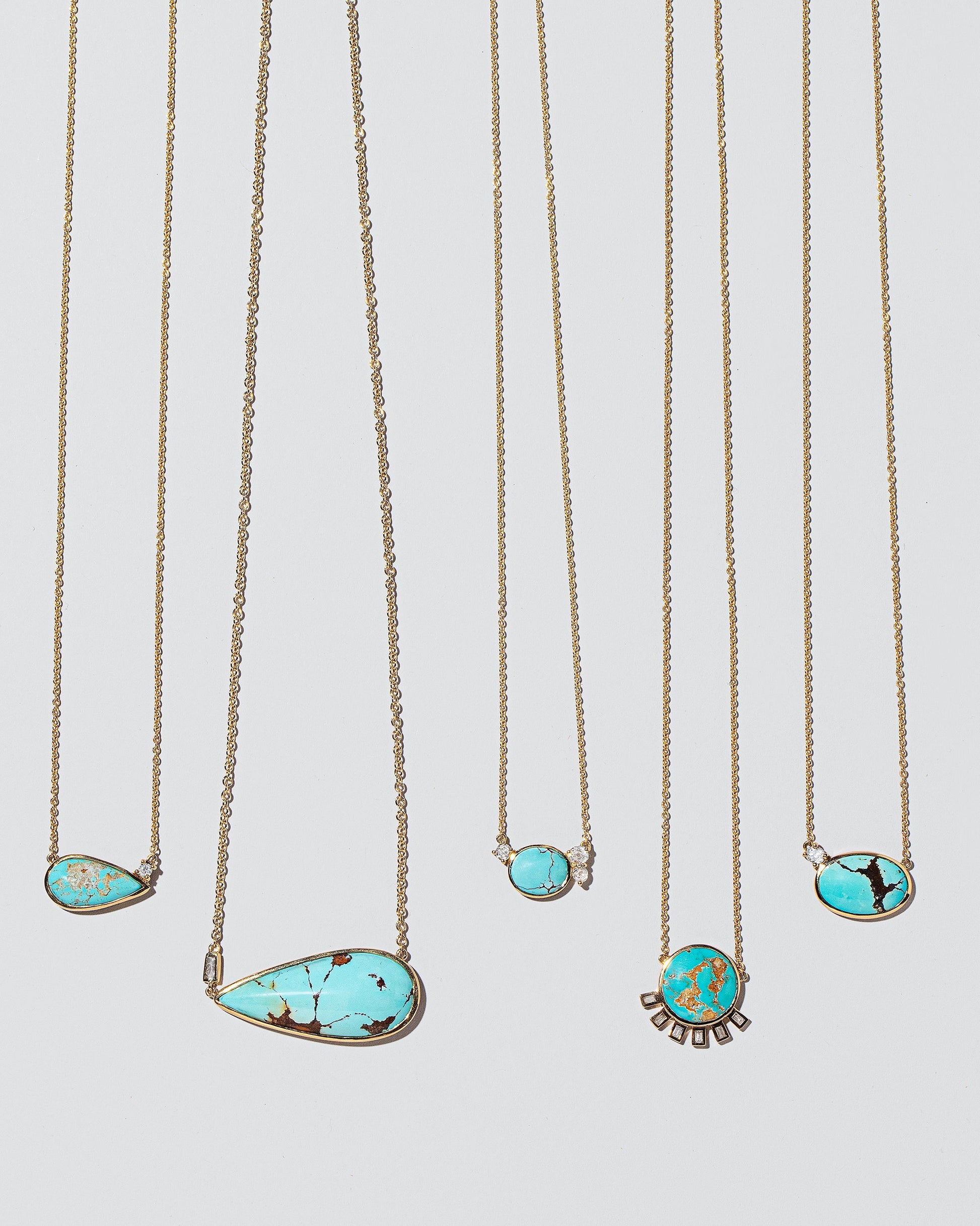 Group of Turquoise Necklaces on light colored background.