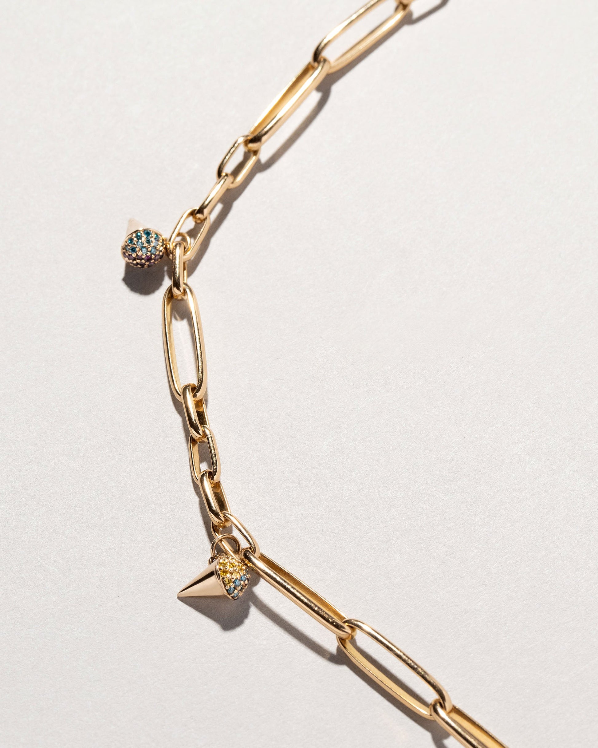  Sno Cone Charm - Sour Grape on light color background.