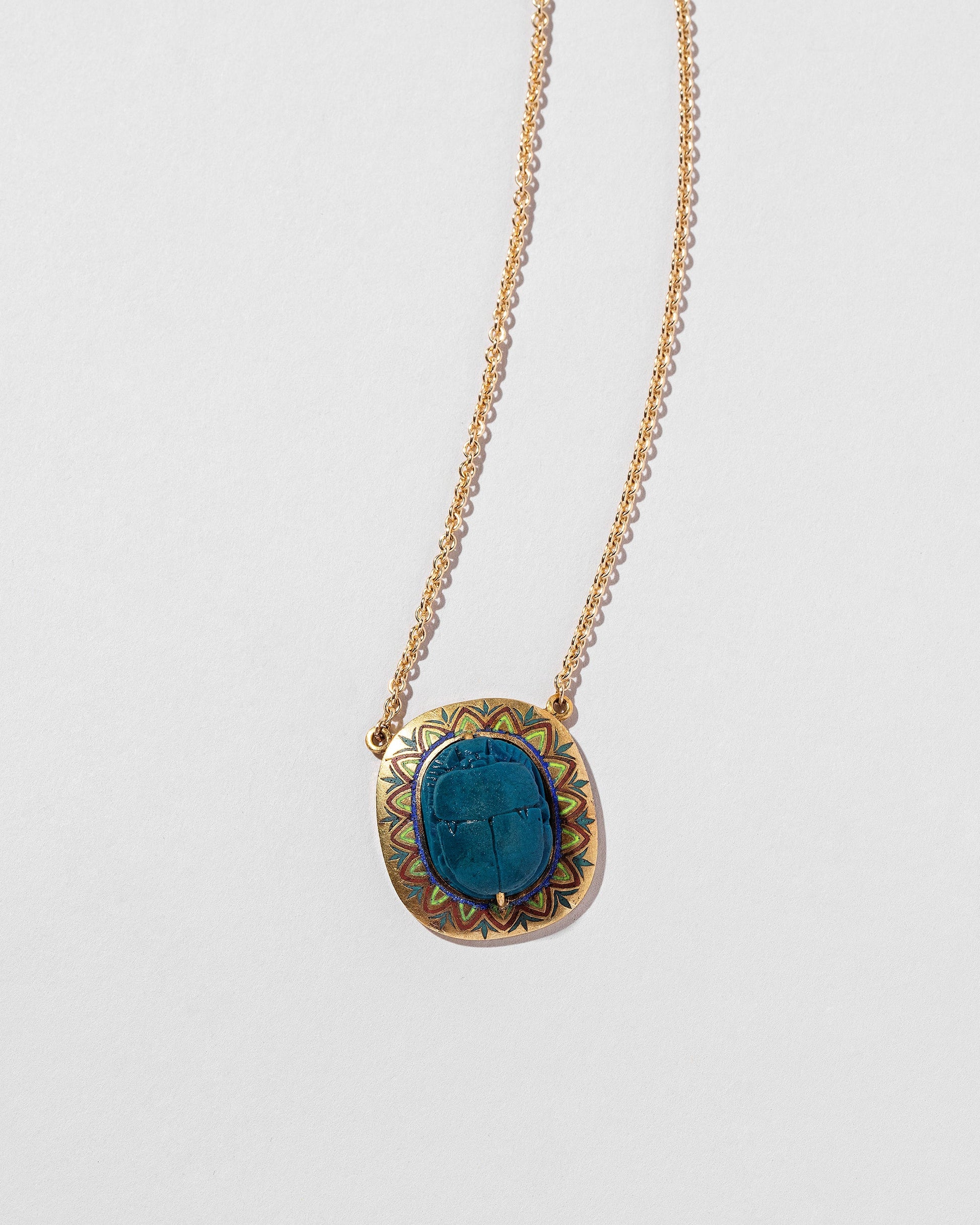  Scarab Necklace on light color background.