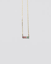  Kiss Me Necklace on light color background.